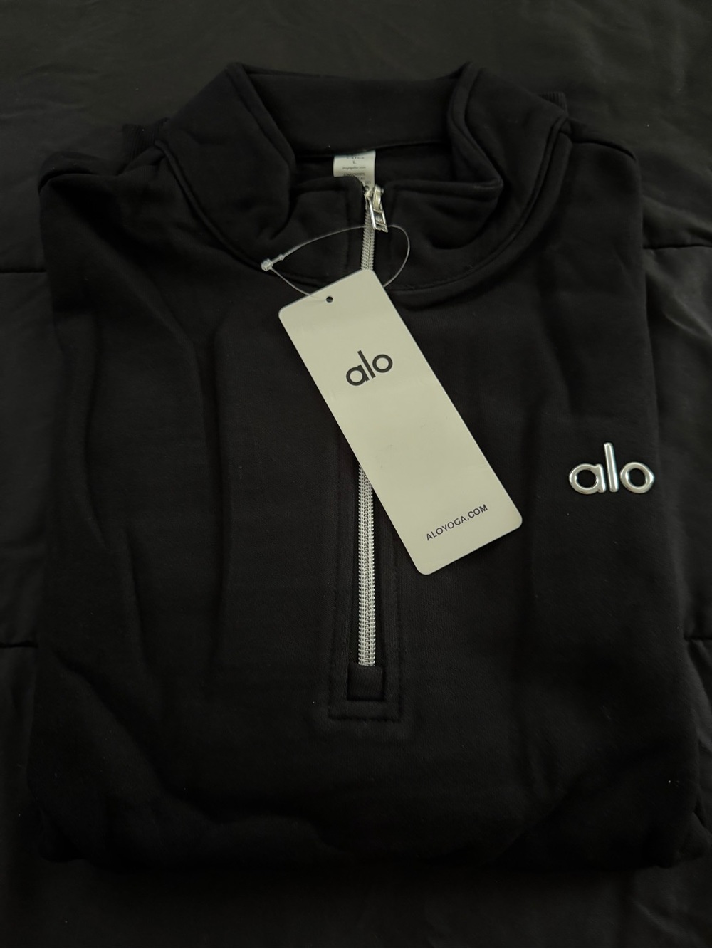 ALO Yoga Men’s Black Half-Zip Pullover with Silver Logo